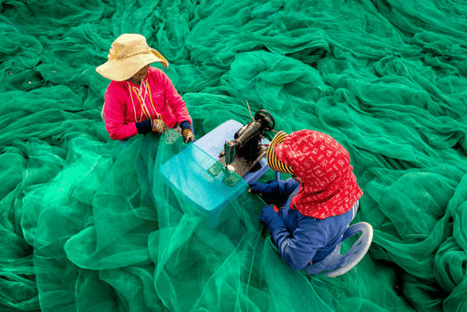 Sewing the fishing nets